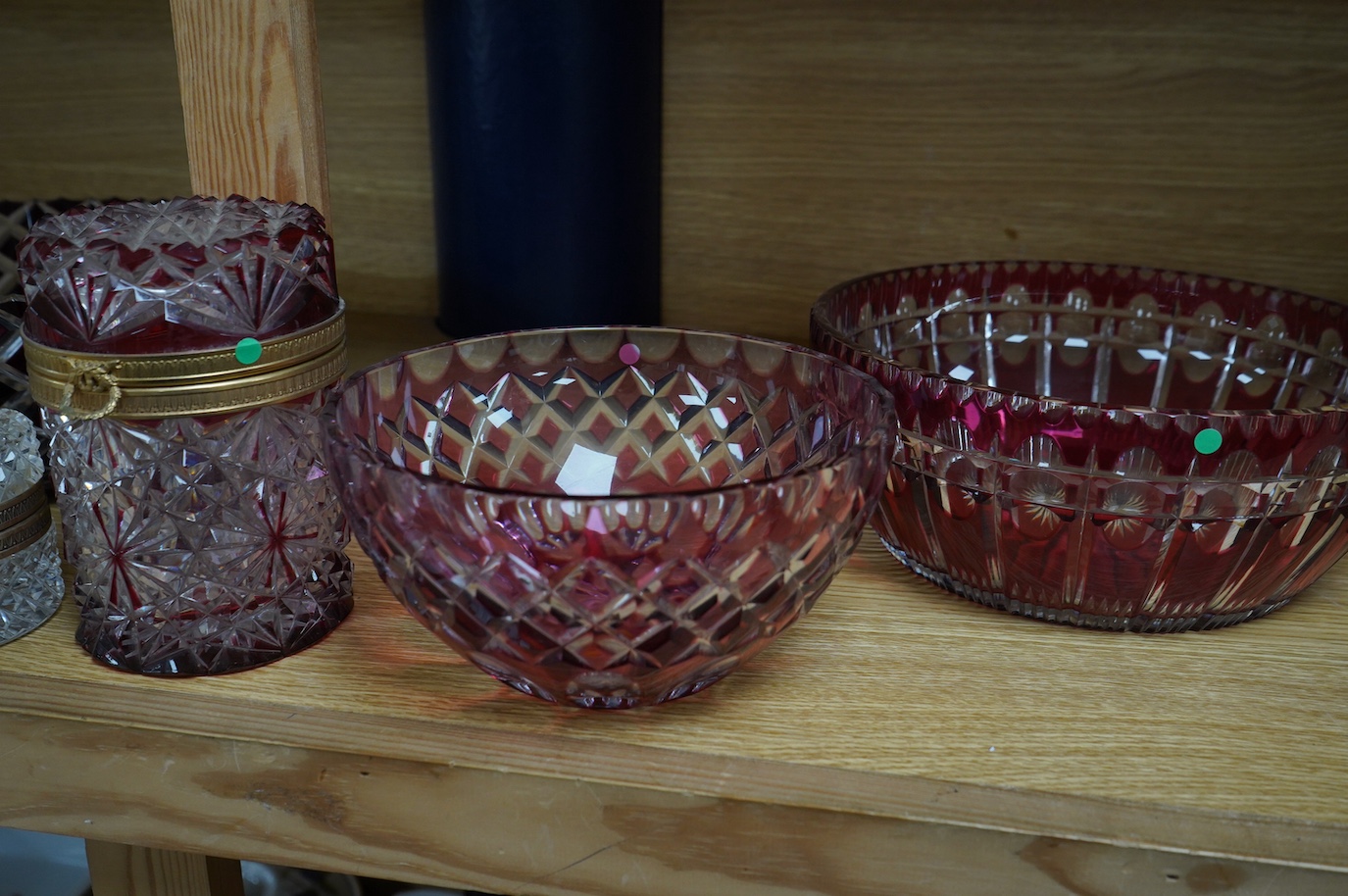 Three Bohemian ruby overlaid glass bowls and two jars, largest bowl 23cm diameter. Condition - some very minor nicks and light surface scratches, otherwise good